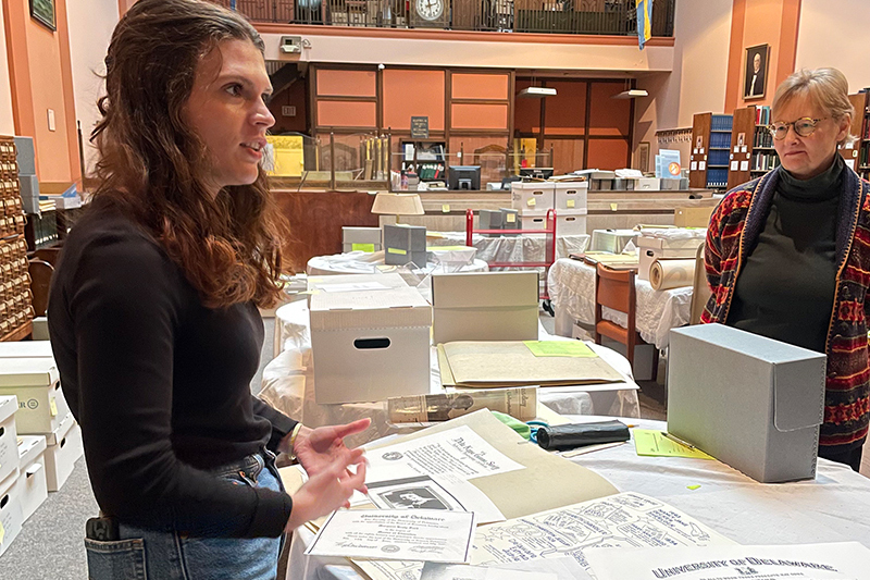 Samantha Hertel explains the documents relating to Margaret Ford’s UD legacy as LuAnn De Cunzo looks on.