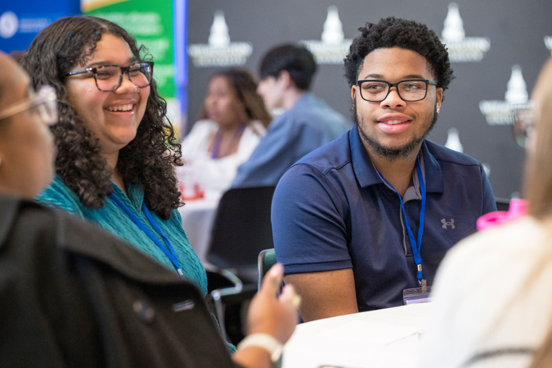 Students attending the Delaware Educators Rising conference, hosted by University of Delaware’s College of Education and Human Development, engage in lively conversation before the event’s keynote presentations.