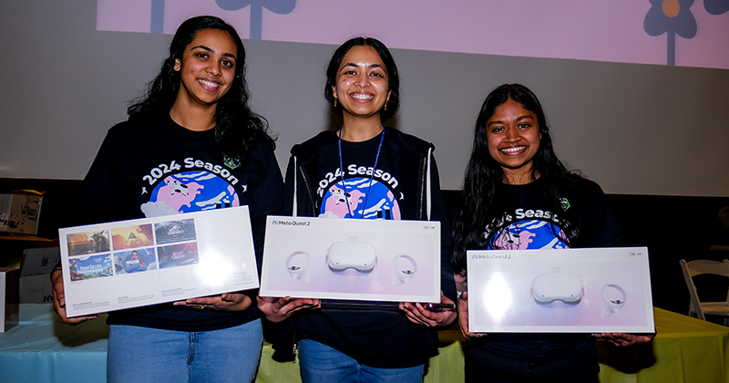(From left) Sneha Nangelimalil, Aparna Roy and Benita Abraham pose with the Meta Quest goggles that they won for their Talk to the Hand hack. 