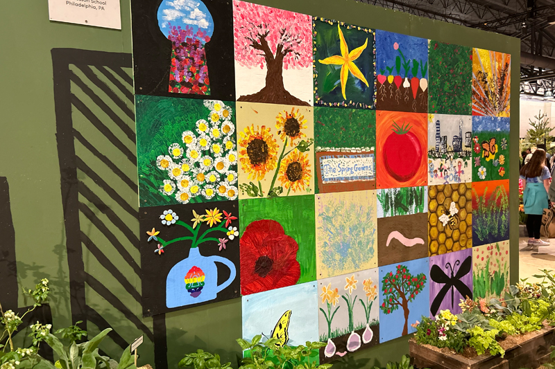 The exhibit featured a mural made out of tiles created by local school children that frequent The Spring Gardens.