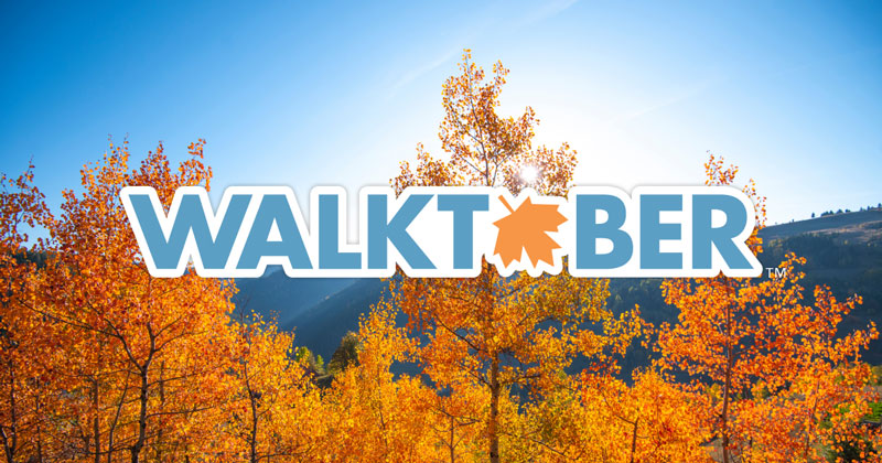 Walktober graphic over fall trees Walktober graphic over fall trees