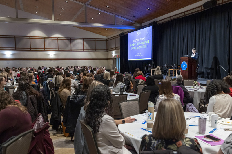 Alison Travers, assistant director of the Delaware Academy for School Leadership in CEHD’s School Success Center, welcomes nearly 400 educators to the Women Leading Delaware Education Conference. Alison Travers, assistant director of the Delaware Academy for School Leadership in CEHD’s School Success Center, welcomes nearly 400 educators to the Women Leading Delaware Education Conference.