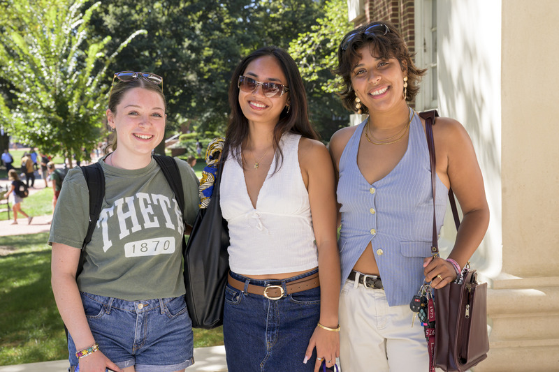 UD seniors (left to right) Alex Keating, Frenchezza Jumawan and Amber Ortiz-Hernandez catch up with each other on The Green in between classes. UD seniors (left to right) Alex Keating, Frenchezza Jumawan and Amber Ortiz-Hernandez catch up with each other on The Green in between classes.