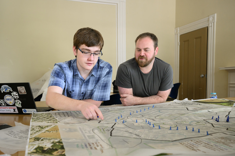 UD junior Matthew Willmes (left), working alongside project adviser Zachery Hammaker, assistant professor of landscape architecture, has been using Geographic Information Systems, or GIS, to help transform complex data such as impervious surfaces, tree canopy cover, and heat exposure in neighborhoods into visual tools to help the Route 9 Community Development Corporation plan toward a healthier future. UD junior Matthew Willmes (left), working alongside project adviser Zachery Hammaker, assistant professor of landscape architecture, has been using Geographic Information Systems, or GIS, to help transform complex data such as impervious surfaces, tree canopy cover, and heat exposure in neighborhoods into visual tools to help the Route 9 Community Development Corporation plan toward a healthier future.