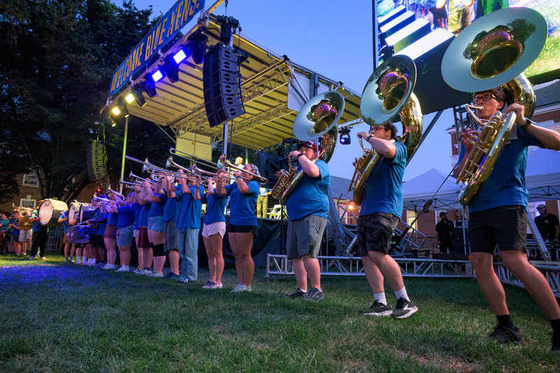 Members of the UD Marching Band lead students in a UD Fight Song sing-off. Members of the UD Marching Band lead students in a UD Fight Song sing-off.