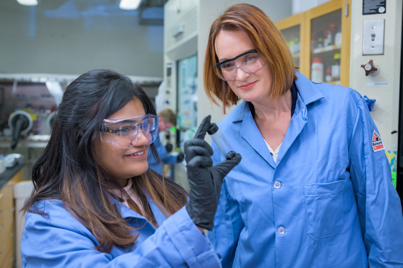 Vidhika Damani and assistant professor Laure Kayser inspect a sample of the reversible conductive hydrogel they developed for bioelectronics applications.