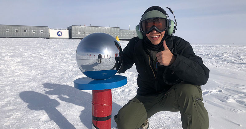 Katy Buoncristiano gives a thumbs up from the bottom of the world. Pictured here, she’s at the ceremonial South Pole marker, about 850 miles south of McMurdo, where she was stationed in Antarctica while serving in the U.S. Air Force.