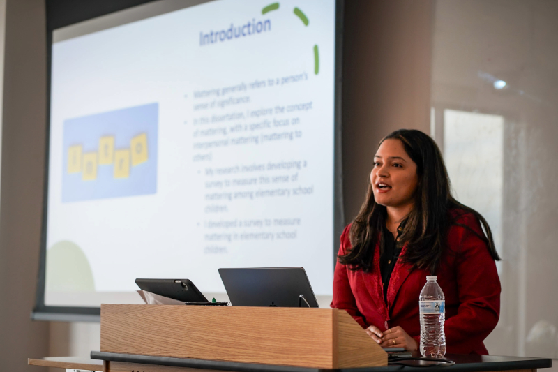Polanco presents the results of her doctoral work at her dissertation defense. Polanco presents the results of her doctoral work at her dissertation defense.