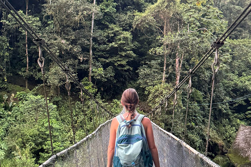UD junior Grace Ferry, a double major in insect and wildlife ecology and conservation, crosses the Pacuare River to retrieve trail cameras set up by students during a study abroad course in Costa Rica. UD junior Grace Ferry, a double major in insect and wildlife ecology and conservation, crosses the Pacuare River to retrieve trail cameras set up by students during a study abroad course in Costa Rica.