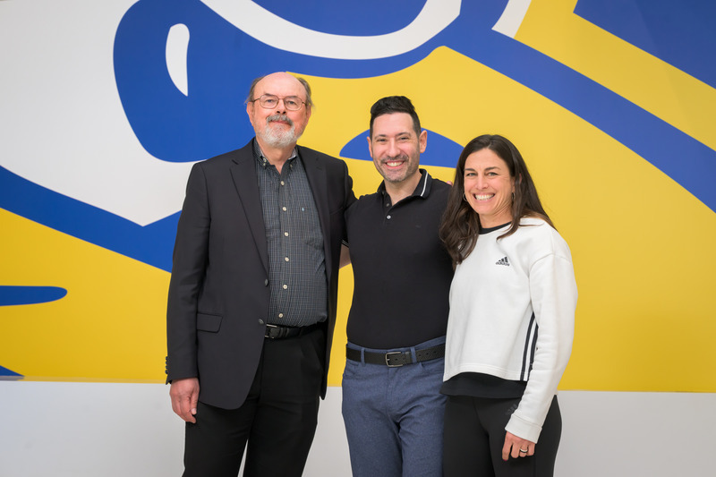 In a visit jointly sponsored by the Departments of English and Athletics, Zetlin (center) poses with John Ernest, chair of English, and fellow English alumnus Jenn Judy, director of talent management and organizational development for Delaware Athletics. In a visit jointly sponsored by the Departments of English and Athletics, Zetlin (center) poses with John Ernest, chair of English, and fellow English alumnus Jenn Judy, director of talent management and organizational development for Delaware Athletics.