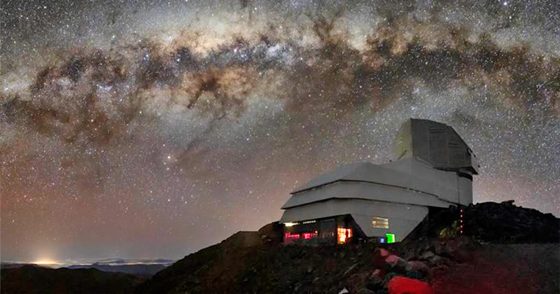 The Vera C. Rubin Observatory stands atop a mountain peak in Chile, from which its telescope and camera will capture extraordinary information about our universe over the next 10 years as part of the Legacy Survey of Space and Time (LSST). University of Delaware researchers and students have had leading roles in this project and anticipate many discoveries as scientists from around the world analyze the images and enormous amounts of data that will be available. In this image, the Milky Way galaxy that includes our solar system is clearly visible in the skies above the observatory. The Vera C. Rubin Observatory stands atop a mountain peak in Chile, from which its telescope and camera will capture extraordinary information about our universe over the next 10 years as part of the Legacy Survey of Space and Time (LSST). University of Delaware researchers and students have had leading roles in this project and anticipate many discoveries as scientists from around the world analyze the images and enormous amounts of data that will be available. In this image, the Milky Way galaxy that includes our solar system is clearly visible in the skies above the observatory.
