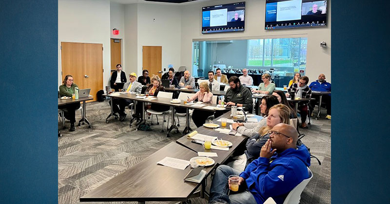 2025 Jason Baehr UD faculty, administrators and Siegfried Fellows sitting in chairs in a classroom