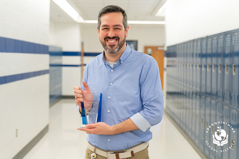 Nathan Moser, a social studies teacher at Middletown High School in Appoquinimink School District, poses for a photo with his Governor’s Award for Excellence in Civics Education. Nathan Moser, a social studies teacher at Middletown High School in Appoquinimink School District, poses for a photo with his Governor’s Award for Excellence in Civics Education.