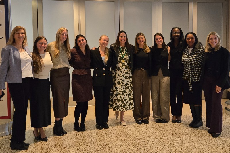 Heddy Demaria (left), Leong’s former UD roommate and current business partner, and Leong (center) with members of UD’s Bateman Competition team. Leong and DeMaria have advised UD’s teams for four years. 