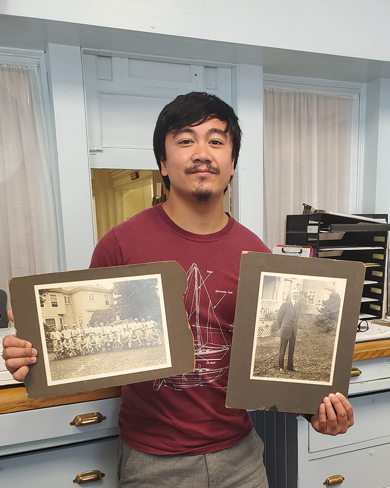 Jay Amamio worked with the Milford Museum’s collections — such as photos of a visit from the Philadelphia Athletics baseball team — which tell the city’s history.