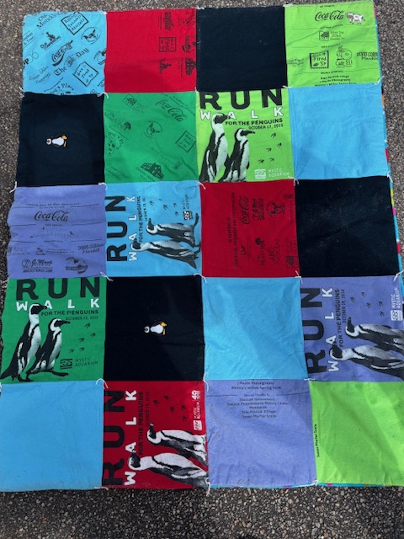Ms. Servidio participated in the “Run/Walk for the Penguins” every October to support conservation efforts.