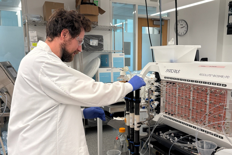 Research associate Paul Kaznica runs experiments in NIIMBL's Process Intensification Testbed on the University of Delaware’s STAR Campus. The facility is designed to accelerate the development of more efficient processes for making monoclonal antibodies and other lifesaving therapies. Research associate Paul Kaznica runs experiments in NIIMBL's Process Intensification Testbed on the University of Delaware’s STAR Campus. The facility is designed to accelerate the development of more efficient processes for making monoclonal antibodies and other lifesaving therapies.