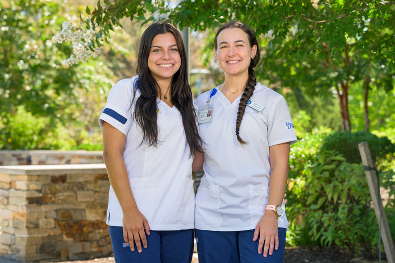School of Nursing seniors Jaidyn Morales-Devine (left) and Erica Di Corpo (right) spent their summers as Flynn Fellows exploring the world of pediatric oncology. Morales-Devine interned at the Children’s Hospital of Philadelphia, and Di Corpo interned at Boston Children's in her home state of Massachusetts. School of Nursing seniors Jaidyn Morales-Devine (left) and Erica Di Corpo (right) spent their summers as Flynn Fellows exploring the world of pediatric oncology. Morales-Devine interned at the Children’s Hospital of Philadelphia, and Di Corpo interned at Boston Children's in her home state of Massachusetts.
