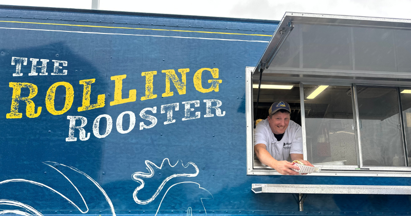 RollingRooster_Thomas_UDaily_Header_ - 1 Serving Food out of the Rolling Rooster Food Truck at STAR Campus