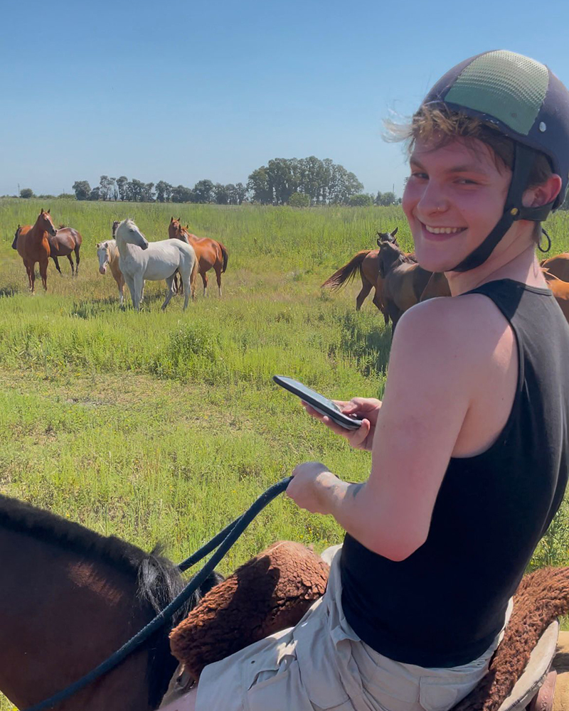 One of Riley Bell’s Spanish-speaking experiences was a Winter 2025 study abroad program in Buenos Aires, Argentina, where he rode a horse gauche-style at Estancia La Bandada.