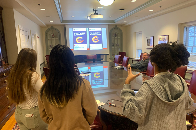 Joycelyn Brown, Chelsea Dao and Haley Lisiecki present their campaign to fire company president Keith Simpkins.
