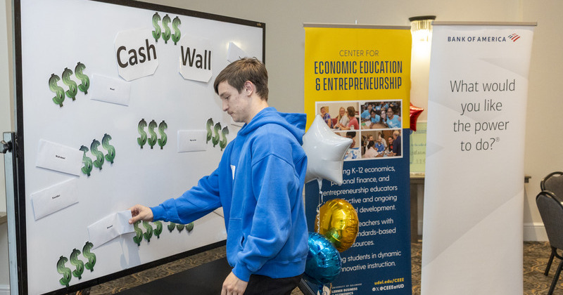 A Delaware high school student participates in the Cash Wall during the 16th annual Delaware Personal Finance Challenge, hosted by UD’s Center for Economic Education and Entrepreneurship. Many students prepared for the challenge using the Keys to Financial Success curriculum, which supports real-world financial decision-making.