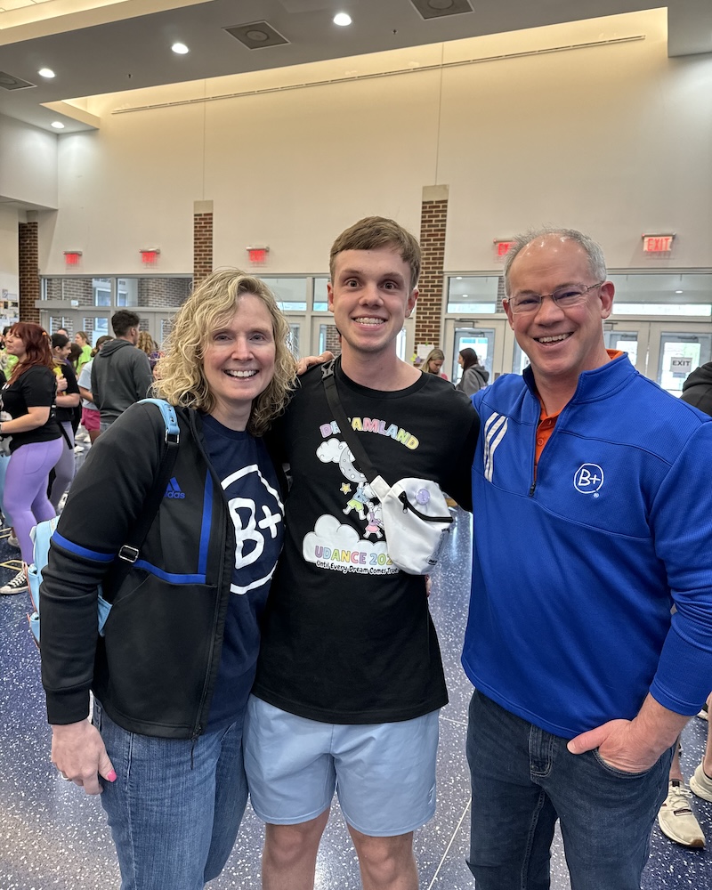 James Kaden, a UD instructor, stands with his wife, Jen, and their son, Brett, a cancer survivor and member of UDance’s executive board. Last weekend marked more than a decade that the family’s been attending the University’s annual dance marathon. 