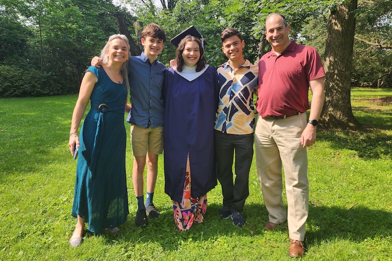 Smith, with her children, (left to right) Ari, Yael and Jonah, and husband, Michael, gathered for a family photo at Yael’s high school graduation from Abington Friends School last year.