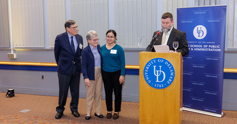 Irene Rodriguez’s commitment to social equity was recognized with the Biden School’s Pauline E. Loessner Memorial Award at the Biden School Celebration of Scholarship Ceremony. Pictured (left to right) are Arno Loessner, Mary Loessner, Rodriguez and Dean Joseph Trainor.