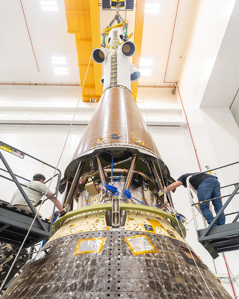 The launch abort system getting installed onto the Orion crew module in preparation for testing at NASA’s Neil Armstrong Test Facility in Sandusky, Ohio. In 2024, Orion completed an 11-month test campaign necessary for the safety and success of Artemis II.
