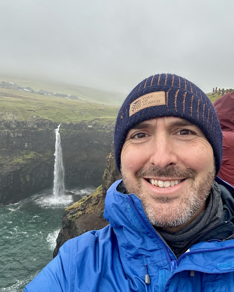 The mighty Mulafossar Waterfall in the Faroe Islands flows beside a tiny village known as Goose Valley — population: 13 people.