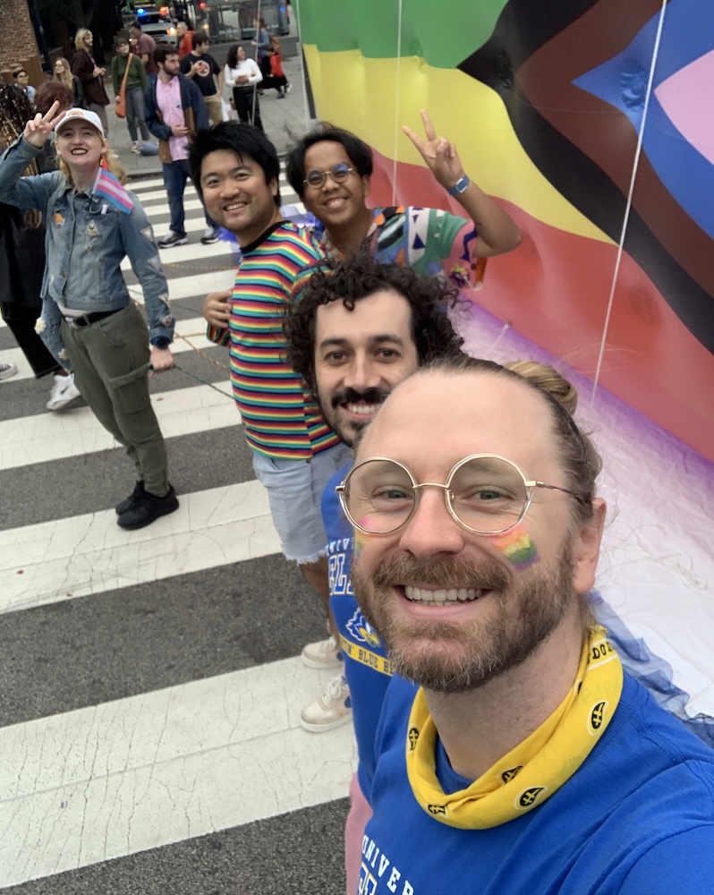 Eric Layland, closest to camera, celebrates queer joy with fellow Blue Hens. Eric Layland, closest to camera, celebrates queer joy with fellow Blue Hens.