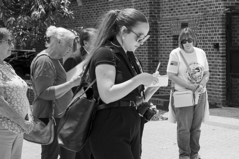 Sarah Cain takes notes at the walk.