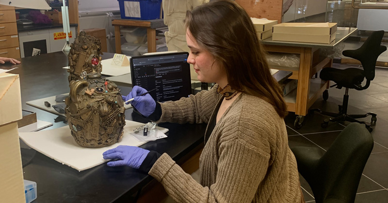 In summer 2025, Leah Palmer completed an internship in archaeological conservation at the University of Pennsylvania’s Gordion Project, located in the village of Yassıhöyük, Ankara, Türkiye. Pictured, she is examining a Memory Jug with Finial. 