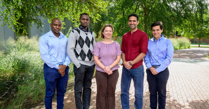 the 2026 DENIN fellows standing in a courtyard