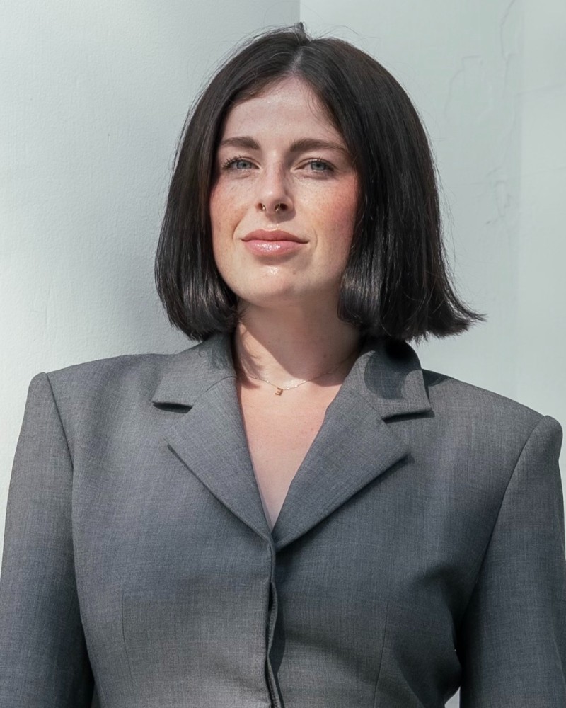 Headshot of Emily Pfender, assistant professor of communication