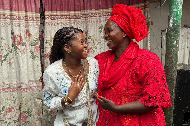 Brown immersed herself in Ghanaian culture during her trip, visiting secondhand markets and attending festivals. Here she’s with a Queen Mother of a Ghanaian family during a culture festival. 
