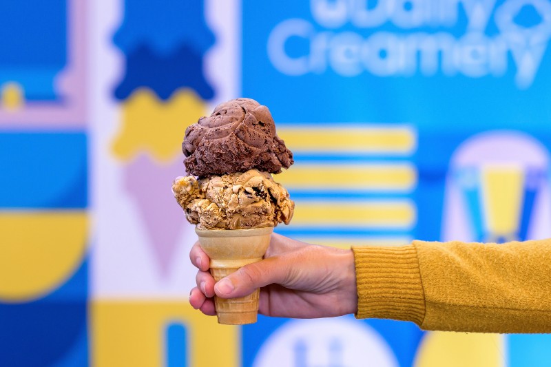 A finished ice cream cone with Delaware River Mud Pie on the bottom and All Nighter on top.