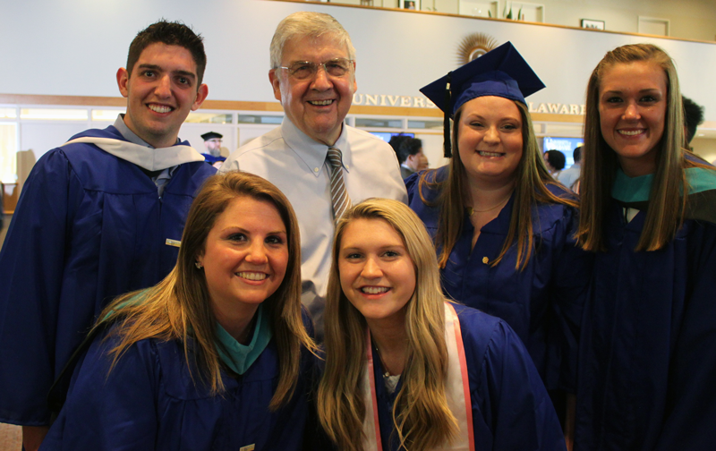 A photo of Dr. Jerome Lewis and students from IPA.