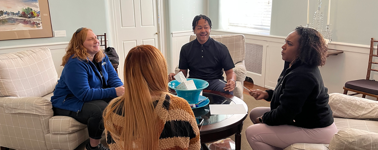 Four Basic Mediation Training participants practice their skills in role play.