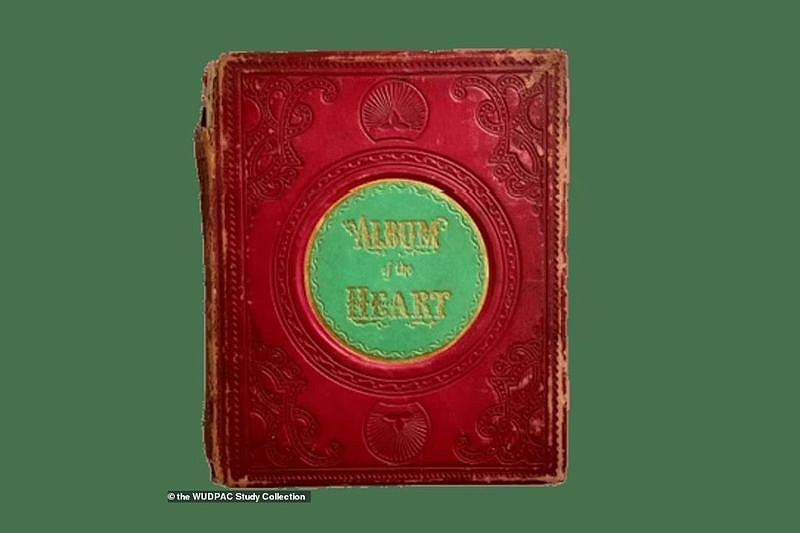 A photo of a Victorian-era book called Album of the Heart