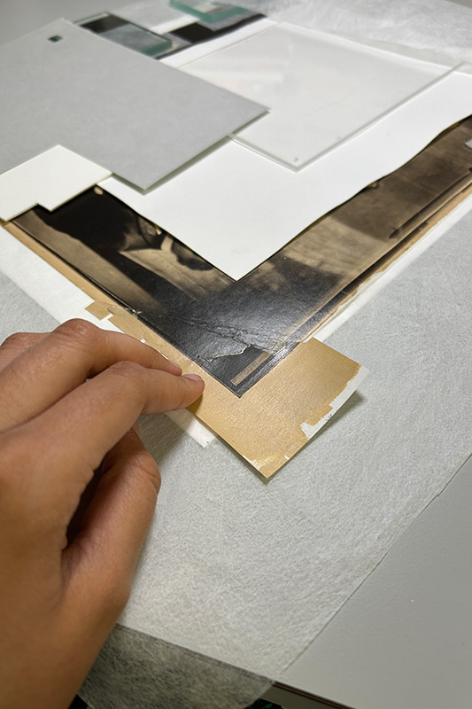 Michaela holding the insert she made for a loss in the Fisk photograph.
