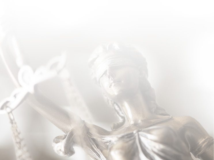 Lady Liberty holding a scale