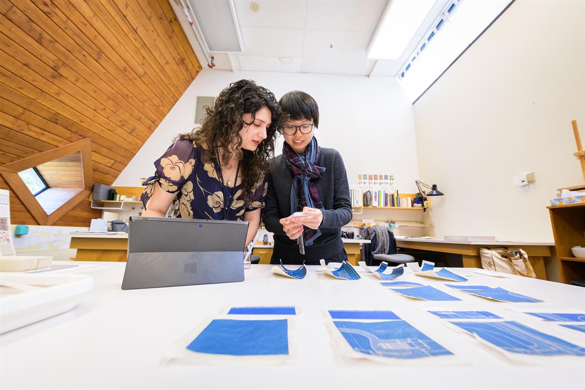 ​Karissa Muratore and Yan Choi test the pH of various samples of blueprints in the Library and Archive Conservation Lab at Winterthur