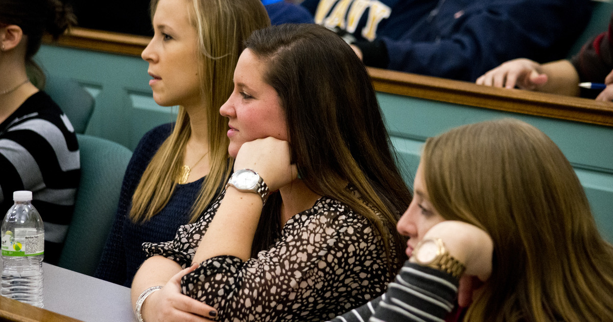 Students listening attentively in a lecture hall