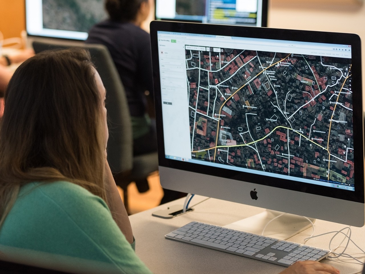 Student working with GIS software
