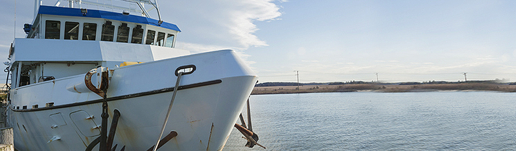 Close up of research vessel docked.