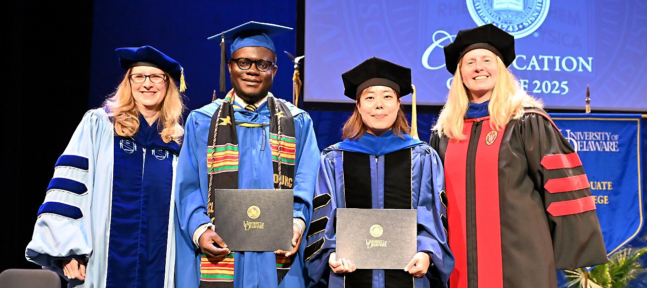 Education and social policy graduates and faculty meet after convocation