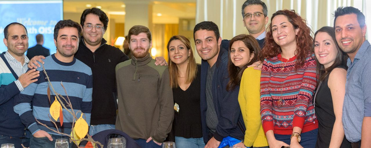 Staff meets with students at international coffee hour