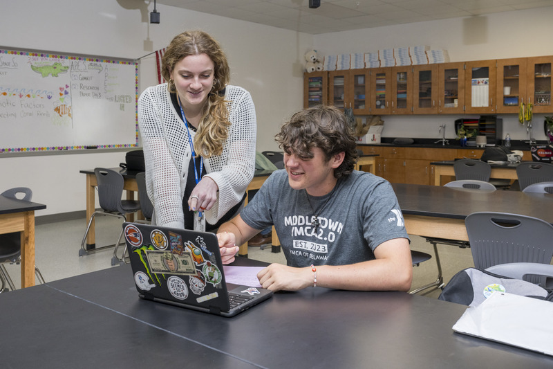 Graduate student teaching earth science in classroom